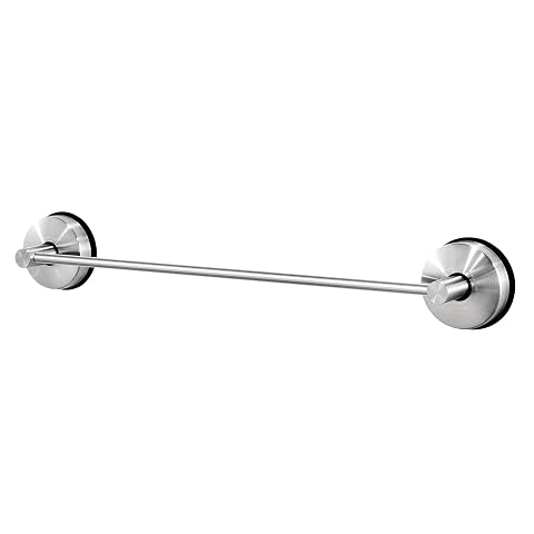 Barre porte-serviettes argentée à ventouses fixée sur un carrelage clair de salle de bain