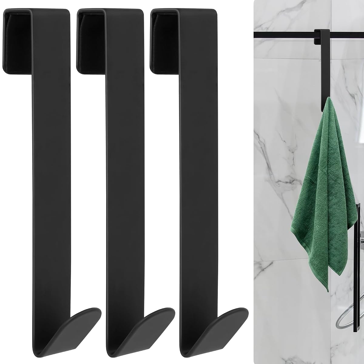 Trois crochets noir mat suspendus au bord d’une porte de douche en verre