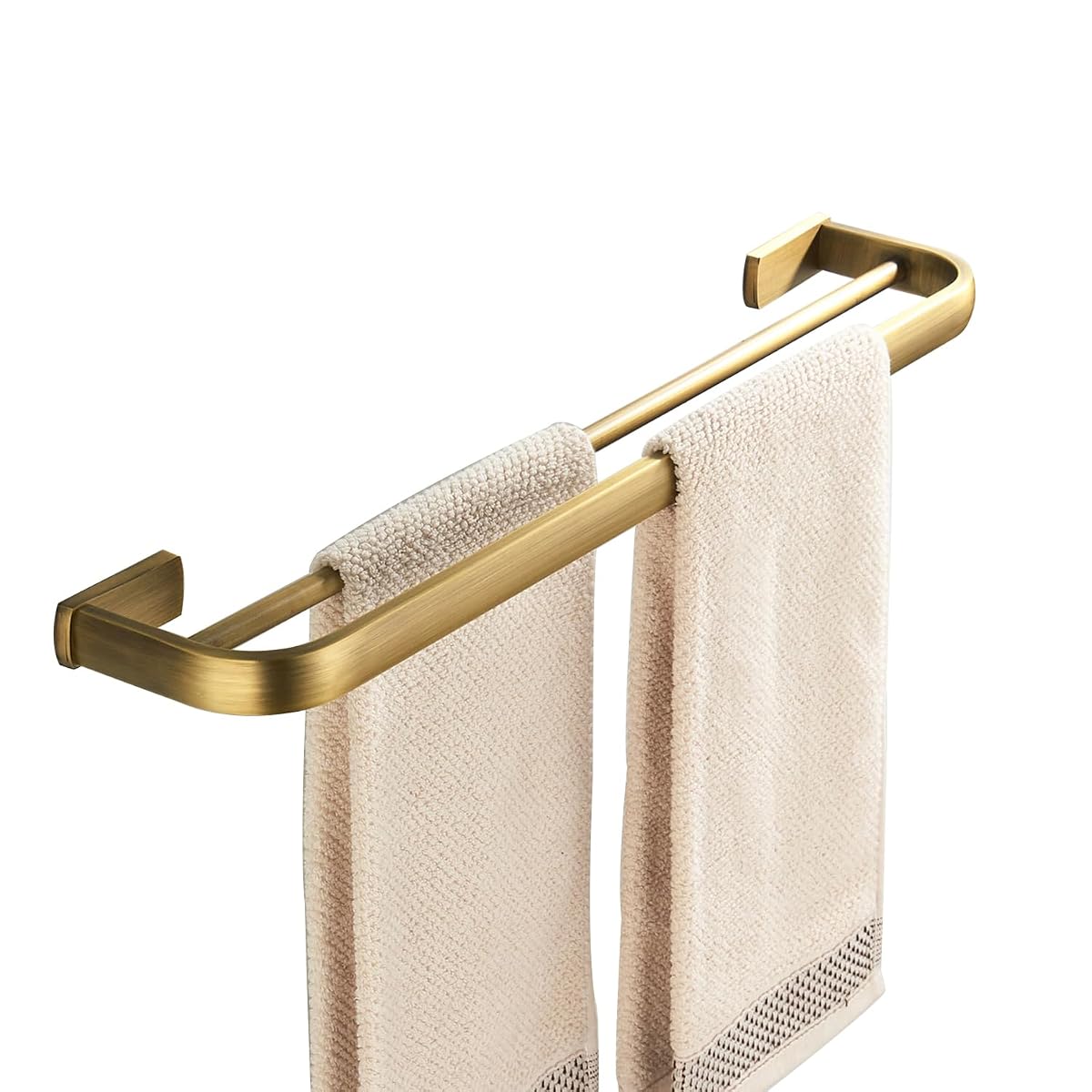 Barre porte-serviettes murale double en laiton brossé doré, installée dans une salle de bain lumineuse.