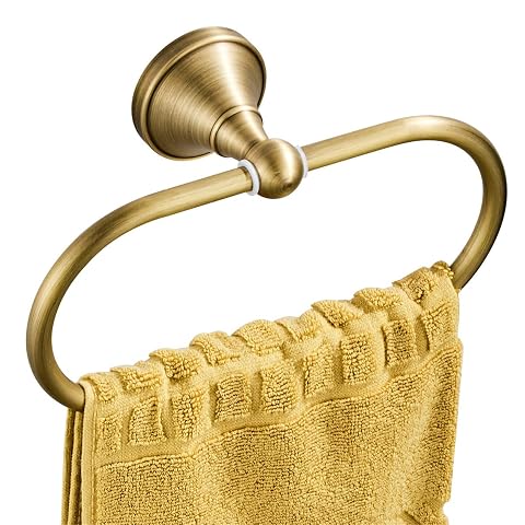Anneau porte-serviettes ovale en laiton brossé antique fixé sur un mur de salle de bain