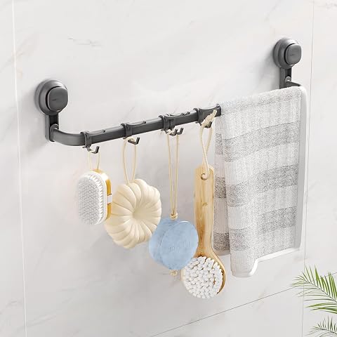 Barre porte-serviettes Luxear gris foncé à ventouses, avec cinq crochets, fixée sur un mur carrelé.