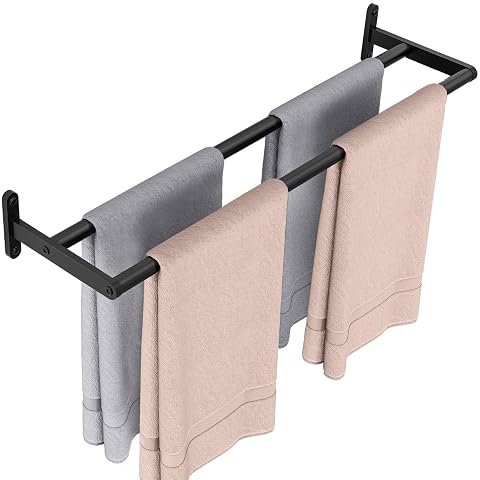 Porte-serviettes mural double barre en acier inoxydable noir mat, installé dans une salle de bain claire.